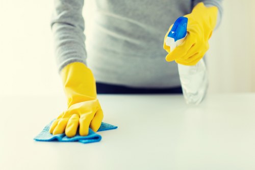 Team member following health and safety procedures in a clean environment